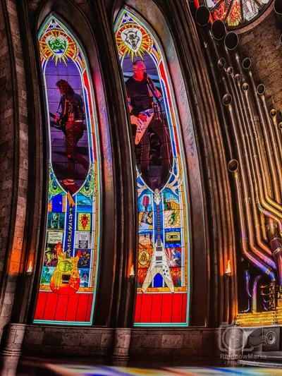 Stained glass windows featuring the band
