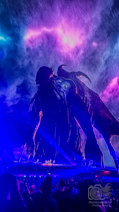 Ktulu rises behind the stage in the storm during The Call of Ktulu