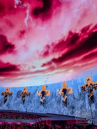The Master of Puppets crosses under a lightning-filled sky